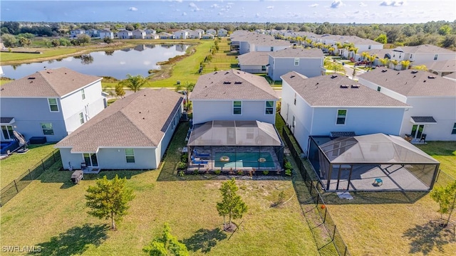 drone / aerial view with a water view