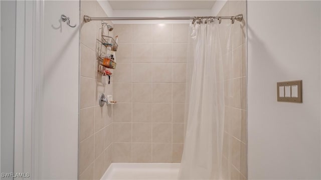 bathroom featuring walk in shower