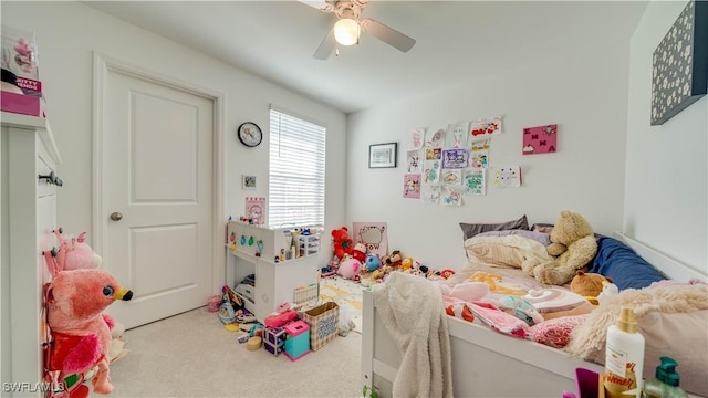 bedroom with ceiling fan and carpet flooring