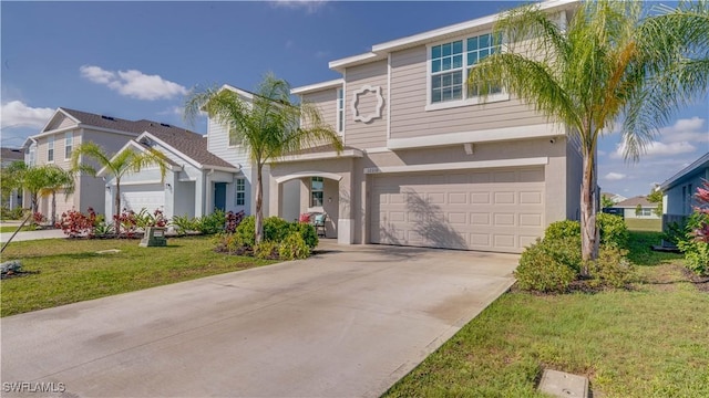 view of front facade featuring a garage and a front yard