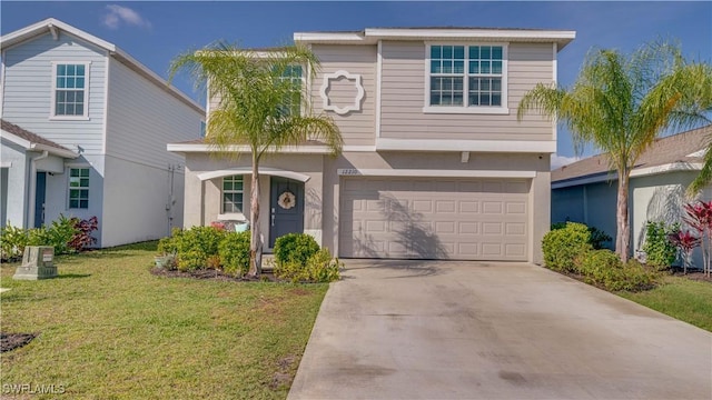 view of front facade featuring a garage and a front lawn