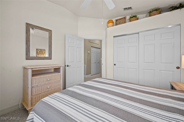 carpeted bedroom with a closet and ceiling fan