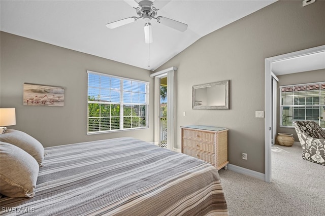 carpeted bedroom with vaulted ceiling and ceiling fan