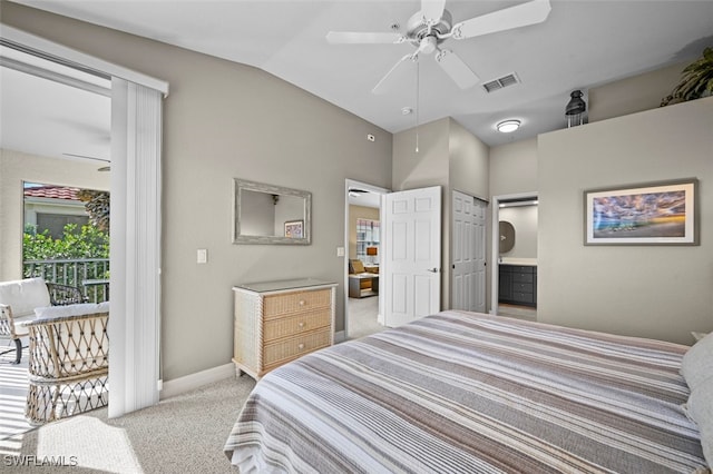 bedroom featuring vaulted ceiling, ensuite bathroom, access to outside, light colored carpet, and ceiling fan