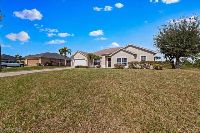 ranch-style house with a garage and a front lawn