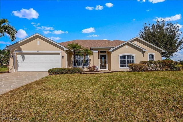 ranch-style home with a garage and a front yard