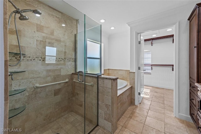 bathroom with vanity, crown molding, and shower with separate bathtub