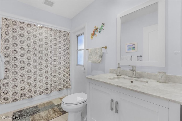 full bathroom featuring vanity, toilet, and shower / bathtub combination with curtain