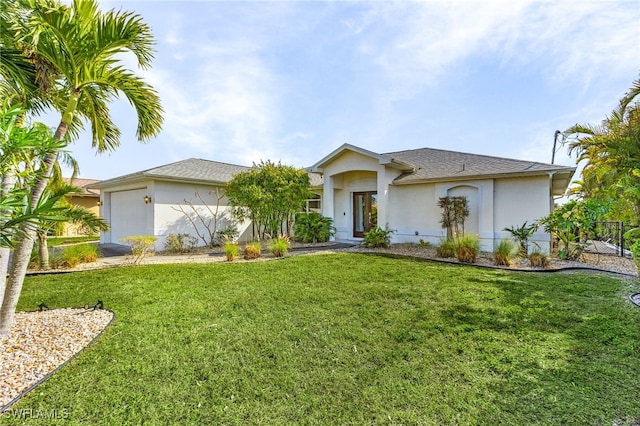 ranch-style home with a garage and a front lawn