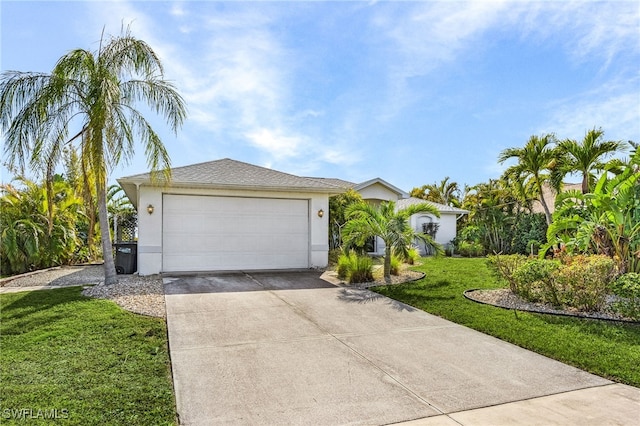 ranch-style home featuring a garage and a front lawn