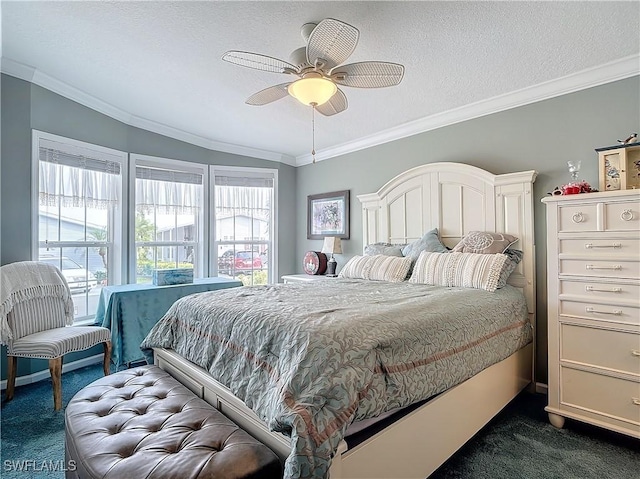 carpeted bedroom featuring lofted ceiling, a textured ceiling, crown molding, and ceiling fan