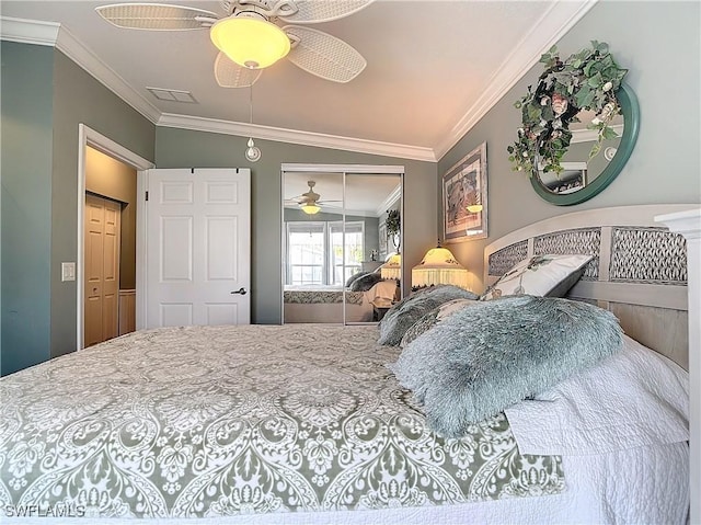 bedroom with lofted ceiling, crown molding, a closet, and ceiling fan