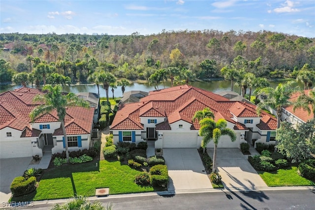 drone / aerial view featuring a water view