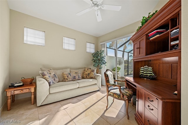 tiled office space with built in desk and ceiling fan