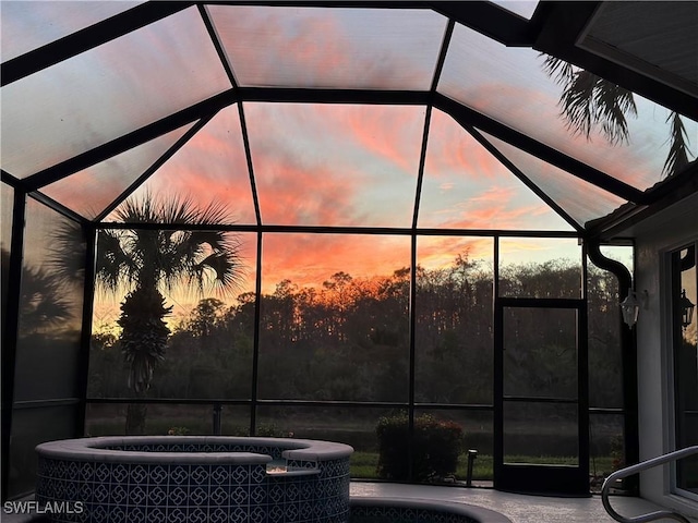 patio terrace at dusk with glass enclosure