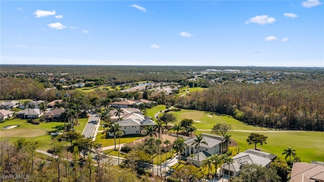 bird's eye view with view of golf course and a residential view