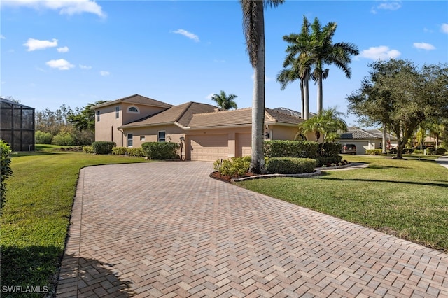 view of front of home with a garage, a front lawn, decorative driveway, and stucco siding