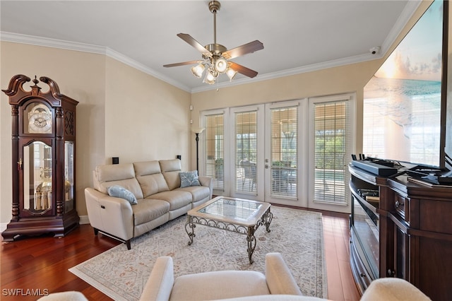 living room with ornamental molding, french doors, dark wood-style flooring, and a ceiling fan