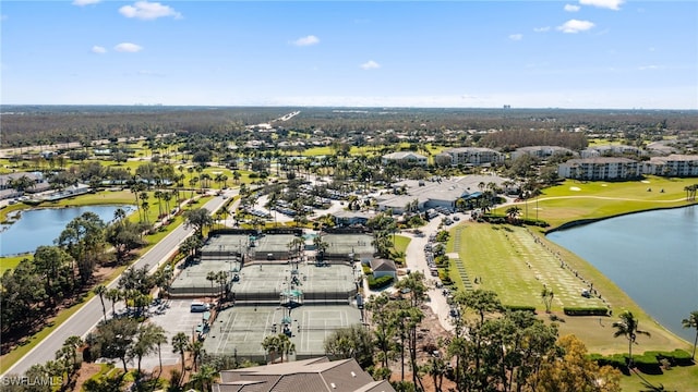 bird's eye view with a water view and a residential view