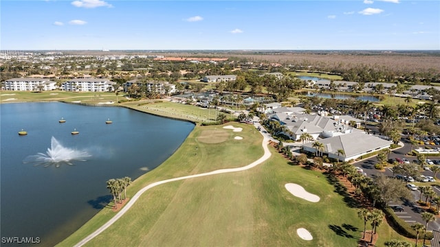 bird's eye view featuring a water view, a residential view, and golf course view