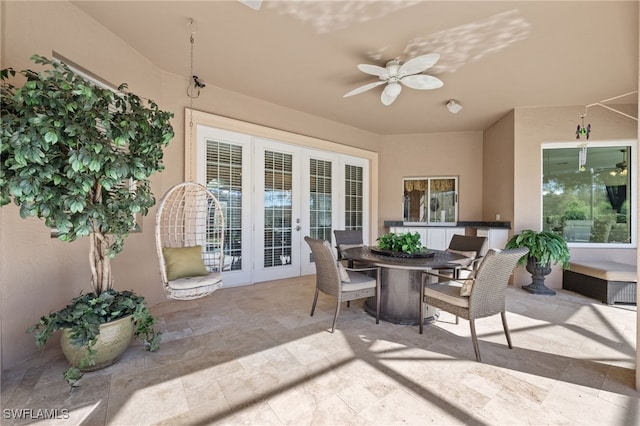 view of patio / terrace featuring a ceiling fan and outdoor dining space