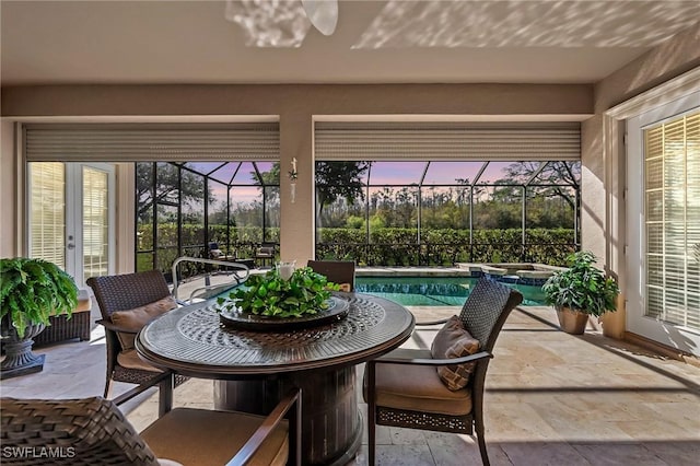 sunroom / solarium with a swimming pool