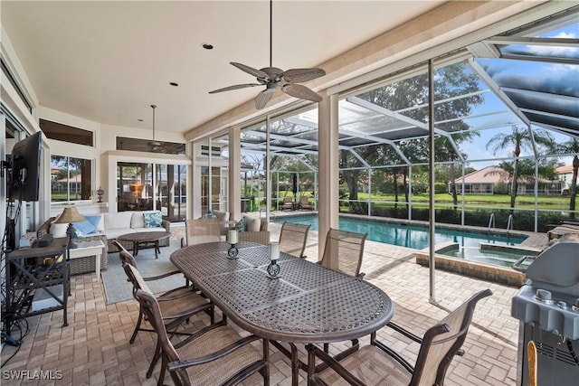 sunroom / solarium featuring a swimming pool