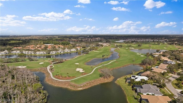 aerial view featuring view of golf course and a water view