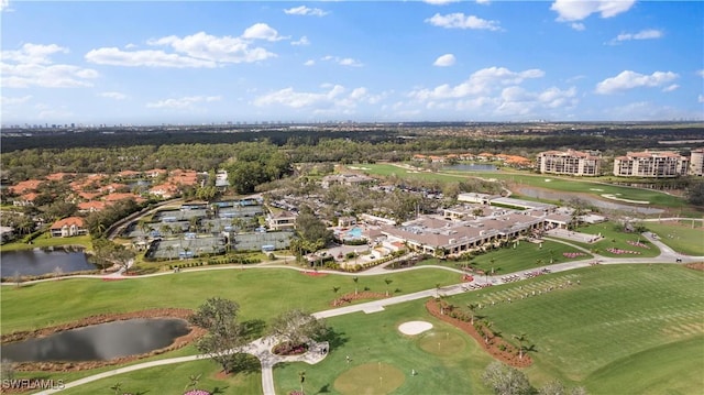 aerial view with a water view and golf course view