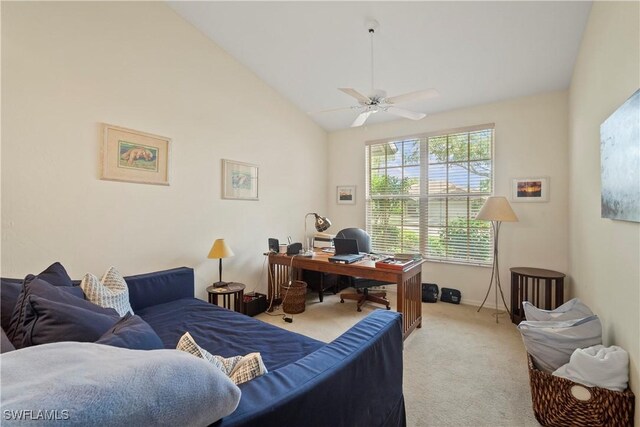 interior space featuring baseboards, vaulted ceiling, and light colored carpet