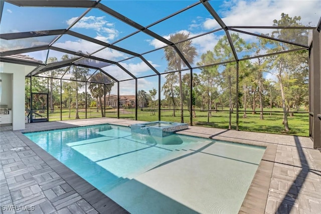 view of swimming pool with an in ground hot tub, glass enclosure, a patio area, and a yard