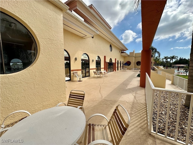 view of patio with a balcony