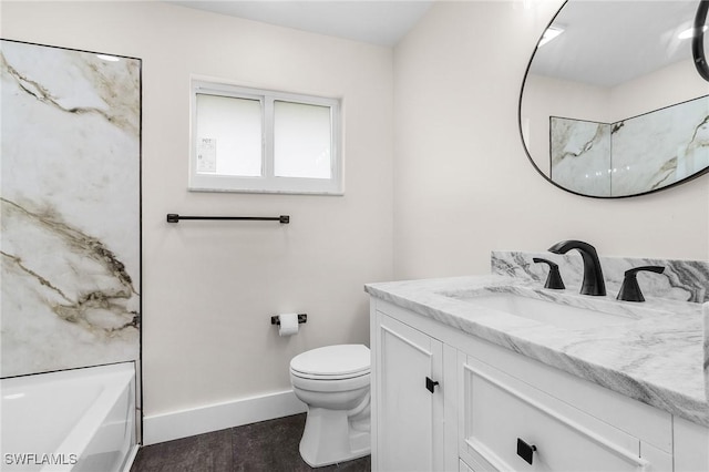 full bath with toilet, vanity, wood finished floors, a tub, and baseboards