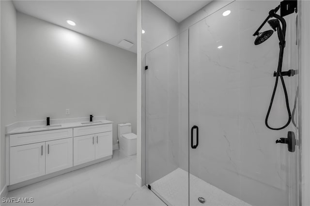 bathroom featuring marble look tile flooring, a marble finish shower, toilet, recessed lighting, and double vanity