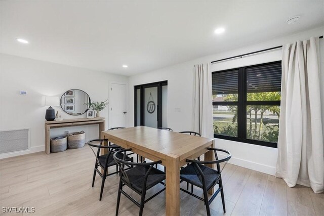 dining room featuring light wood-type flooring