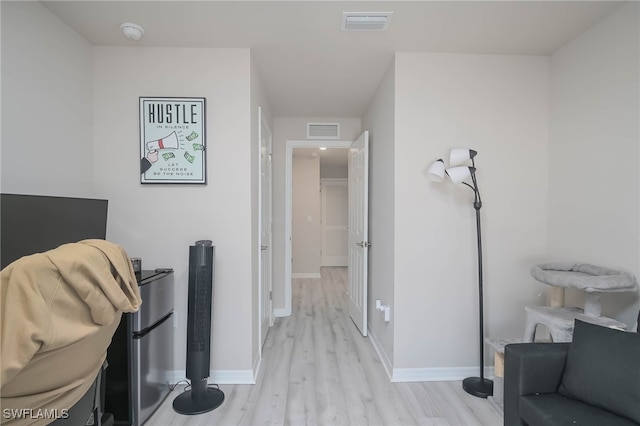 hall featuring light hardwood / wood-style flooring