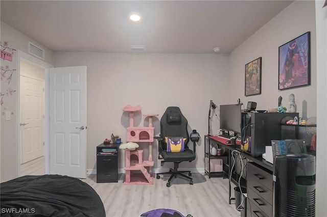 bedroom with light wood-type flooring