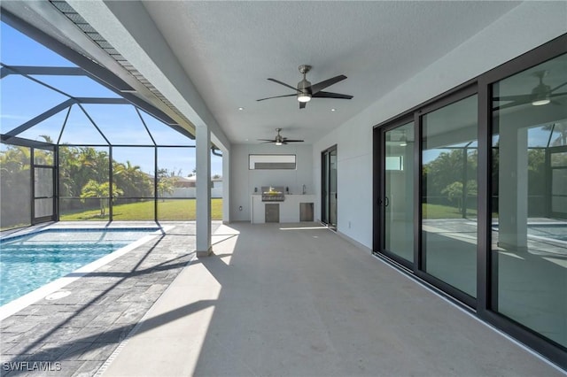 view of swimming pool featuring a lanai, area for grilling, ceiling fan, and a patio area