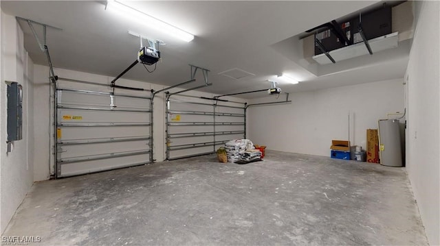 garage featuring a garage door opener, electric panel, and water heater