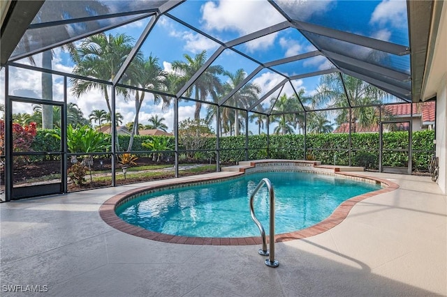 view of pool featuring a patio and a lanai