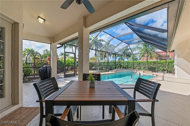 view of patio featuring a fenced in pool, a lanai, and ceiling fan