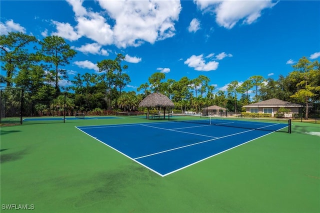 view of sport court with a gazebo