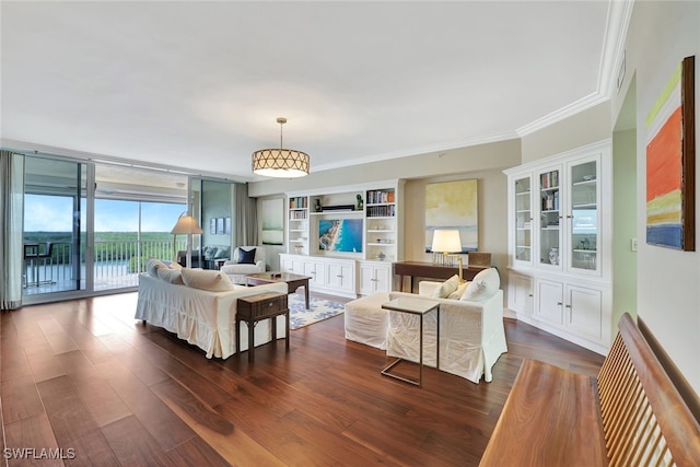 living room with crown molding, a wall of windows, dark hardwood / wood-style flooring, and built in shelves