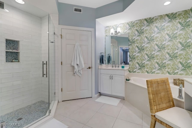 bathroom with vanity, shower with separate bathtub, and tile patterned flooring