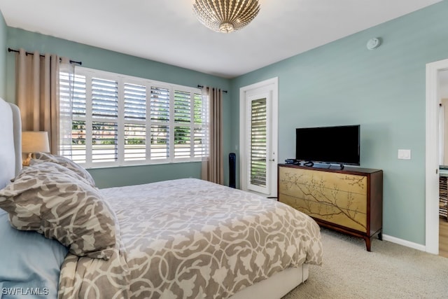 bedroom featuring carpet