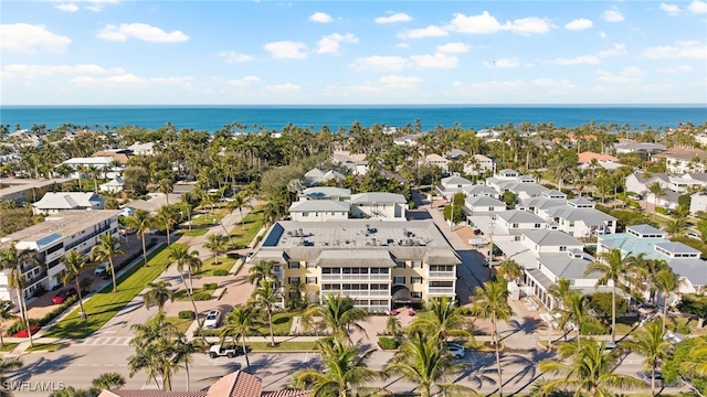 aerial view featuring a residential view and a water view