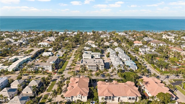 aerial view featuring a residential view and a water view