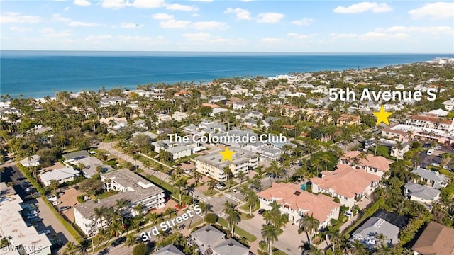 aerial view with a residential view and a water view