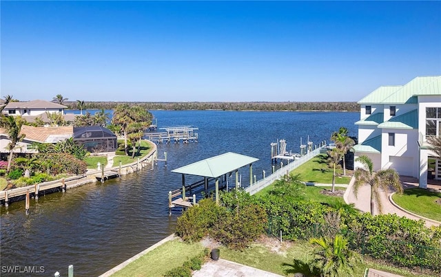 view of water feature with a dock