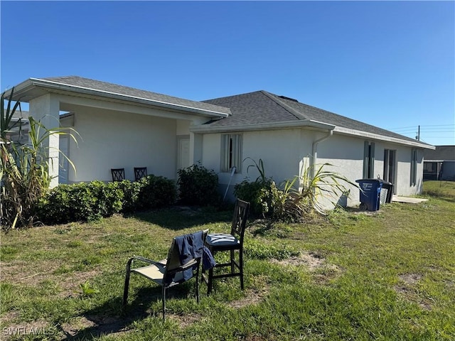 exterior space with a yard